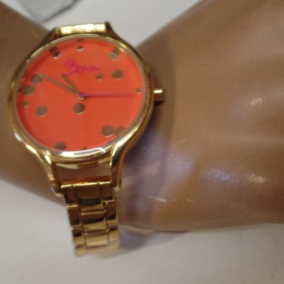 BOUM Jewelry - Boum Golftone Orange Face Watch 8" Pre Owned Condi